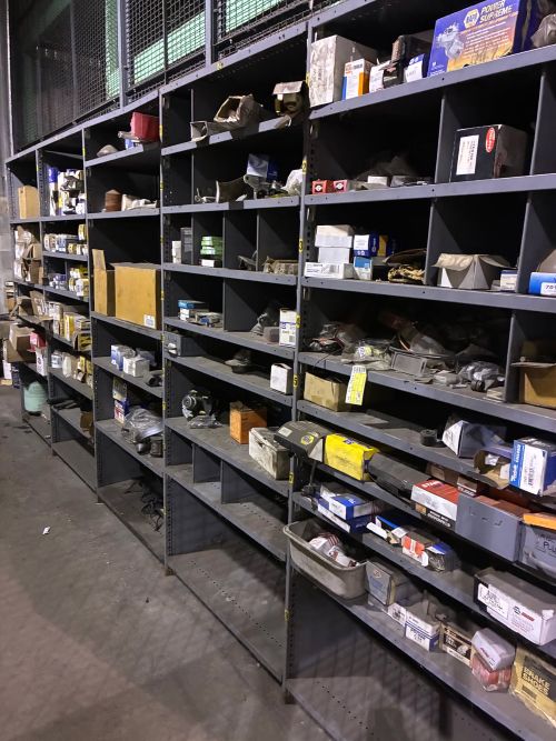 Lot of Miscellaneous Auto Parts with Shelving Units